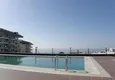Купить Апартаменты 1+1 с панорамным видом на море в зеленом районе Каргыджак 6 