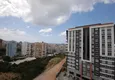 Доступная покупка Четырехкомнатная квартира в новом комплексе района Махмутлар 18 