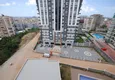 Доступная покупка Четырехкомнатная квартира в новом комплексе района Махмутлар 19 
