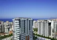 Купить Четырехкомнатная квартира в новом комплексе района Махмутлар 3 