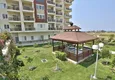 Купить Новая квартира 2+1 в жилом комплексе с собственным пляжем в районе Авсаллар 18 
