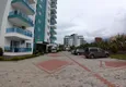 Купить Квартира 2+1 с видом на море и горы в комфортабельном комплексе в Махмутларе 3 