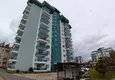 Купить Квартира 2+1 с видом на море и горы в комфортабельном комплексе в Махмутларе 4 
