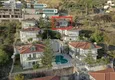 Купить Трехэтажный коттедж с прилегающим садом и великолепным видом  10 