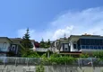 Купить Трехэтажный коттедж с прилегающим садом и великолепным видом  11 