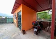 Купить Отдельно стоящий двухэтажный особняк с частным бассейном, мебелью, садом 26 