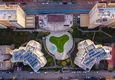 Купить Просторная трехкомнатная квартира по умеренной цене в Махмутларе 12 