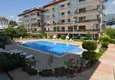 Купить Двухуровневая квартира с четырьмя спальнями и выходом в сад - по доступной цене 1 