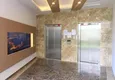 Купить Квартира в Махмутларе трехкомнатная с частичным видом на море в молодом комплексе 15 