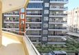 Купить Трехкомнатная квартира по очень выгодной цене в Махмутларе 2 