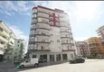 Купить Трехкомнатная квартира по доступной цене рядом с морем в Махмутларе 1 
