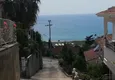 Купить Двухэтажная вилла с садиком и великолепным видом на море в районе Демирташ 4 