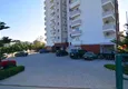 Купить Совершено новая двухкомнатная квартира в жилом комплексе в Махмутларе  10 