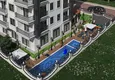 Купить Элитный жилой комплекс на этапе строительства в самом центре курортного городка Махмутлар 10 