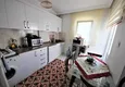 Доступная покупка Меблированная трехкомнатная квартира рядом с морем в районе Махмутлар 14