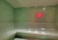 Купить Квартира с двумя спальнями в комплексе класса люкс с частным пляжем в районе Авсаллар 21 