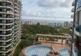 Купить Двухкомнатная квартира с видом на море в роскошном комплексе в районе Махмутлар 1 