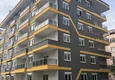 Купить Двухкомнатная квартира с мебелью в молодом комплексе рядом с морем в Махмутларе 6 