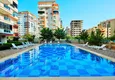 Купить Трехкомнатная квартира с мебелью в благоустроенном комплексе в Махмутларе 2 