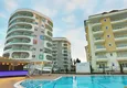 Купить Квартира с двумя спальнями в комплексе класса люкс с частным пляжем в районе Авсаллар 2 