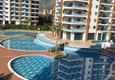 Купить Двухкомнатная квартира с видом на море в роскошном комплексе в районе Махмутлар 7 