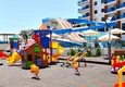 Купить Двухкомнатная квартира с видом на море в роскошном комплексе в районе Махмутлар 10 
