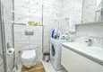 Доступная покупка Квартира с двумя спальнями в комплексе класса люкс с частным пляжем в районе Авсаллар 13 