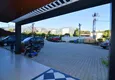 Купить Совершено новая двухкомнатная квартира в жилом комплексе в Махмутларе  9 
