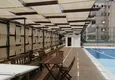 Купить Меблированная квартира с частичным видом на море в Махмутларе 9 