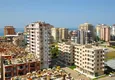 Купить Четырехкомнатная квартира с видом на море в районе Махмутлар 1 