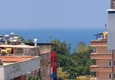 Доступная покупка Трехкомнатная квартира с видом на море в молодом современном комплексе в Махмутларе 9 