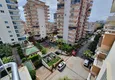 Доступная покупка Суперцена! Двухуровневый пентхаус в уютном жилом комплексе в Махмутларе 11
