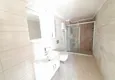 Доступная покупка Трехкомнатная квартира с видом на море в молодом современном комплексе в Махмутларе 19 
