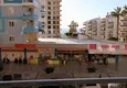 Купить Просторная трехкомнатная квартира с частичным видом на море в районе Махмутлар 1 
