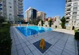 Купить Дуплекс с дизайнерским ремонтом с видом на море в молодом комплексе в Махмутларе 3 