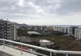 Доступная покупка Меблированный двухуровневый пентхаус с видом на море в районе Махмутлар 3