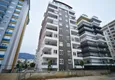Купить Большая квартира для всей семьи в новом комплексе с крытым бассейном - Махмутлар 3 
