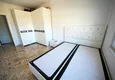 Доступная покупка Трехкомнатная квартира с видом на море и горы в районе Махмутлар 5 