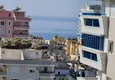 Доступная покупка Дуплекс с дизайнерским ремонтом с видом на море в молодом комплексе в Махмутларе 8 