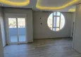 Доступная покупка Шикарный двухуровневый пентхаус с видом на море в районе Махмутлар 6 