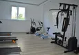Купить Квартира в районе Махмутлар с отдельной кухней и мебелью 14