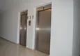 Купить Квартира в районе Махмутлар с отдельной кухней и мебелью 17