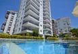 Купить Новые квартиры в Махмутларе в жилом комплексе в вблизи от моря  1 