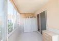 Доступная покупка Трехкомнатная квартира в самом центре Махмутлара с видом на море 18