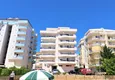 Купить Отличный пентхаус с видом на море на центральной улице района Махмутлар 3