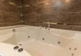 Доступная покупка Трехуровневый коттедж в Кестеле в стиле хай-тек с исключительным панорамным видом 54
