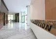 Купить Двухкомнатная квартира в роскошном комплексе района Махмутлар 12