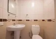 Доступная покупка Трехкомнатная квартира в районе Тосмур с частичным видом на море 14 