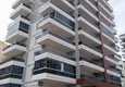 Купить Большая двухкомнатная квартира в Махмутларе, в молодом комплексе  11 