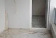 Доступная покупка Двухкомнатная квартира в Махмутлар в жилом комплексе рядом с морем 11 